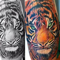 Gwan Soon Lee Tattoos and Piercings