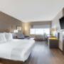 One King Bed Guest Room with Walk-in Shower One King Bed Guest Room with Walk-in Shower