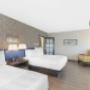 Two Queen Bed Family Suite Guest Room with separate bedroom Two Queen Bed Family Suite Guest Room with separate bedroom