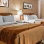Guest room with double beds Guest room with double beds