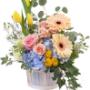 BASKET ARRANGEMENT: soft pastels of florals in a basket BASKET ARRANGEMENT: soft pastels of florals in a basket