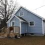 New siding, some new windows, and a new back step. New siding, some new windows, and a new back step.