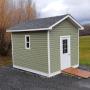 New shed with interior shelving. New shed with interior shelving.