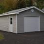 Garage with one garage door and one man door. Garage with one garage door and one man door.