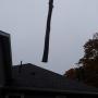 CRANE ASSIST TAKING TREE TRUNK OVER HOUSE FROM BACK YARD TO FRONT CRANE ASSIST TAKING TREE TRUNK OVER HOUSE FROM BACK YARD TO FRONT