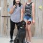 Two ladies pose for a picture with their poodle at Sage Creek Animal Hospital. Two ladies pose for a picture with their poodle at Sage Creek Animal Hospital.