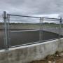 Manure pit fence with gates Manure pit fence with gates