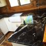 WOW FACTOR Titanium Granite atop white custom cabinets. WOW FACTOR Titanium Granite atop white custom cabinets.
