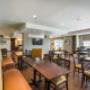 Enjoy breakfast in this seating area Enjoy breakfast in this seating area