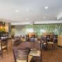 Enjoy breakfast in this seating area Enjoy breakfast in this seating area