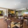 Enjoy breakfast in this seating area Enjoy breakfast in this seating area