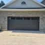 Custom garage door installation by Anchor Doors, enhancing curb appeal. Custom garage door installation by Anchor Doors, enhancing curb appeal.
