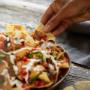 Nachos can be loaded with grilled adobo chicken, house-made pico de gallo and QDOBA's signature 3-cheese queso, free on any entrée! Nachos can be loaded with grilled adobo chicken, house-made pico de gallo and QDOBA's signature 3-cheese queso, free on any entrée!