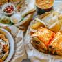 Flavorful burritos, quesadillas and salads are all made with freshly prepared, in-house ingredients like hand-smashed guacamole and pico de gallo. Flavorful burritos, quesadillas and salads are all made with freshly prepared, in-house ingredients like hand-smashed guacamole and pico de gallo.