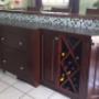 Part of this kitchen was a beautiful, and unique custom designed island, incorporating a mini bar and wine rack. Part of this kitchen was a beautiful, and unique custom designed island, incorporating a mini bar and wine rack.