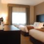 Spacious room with queen beds Spacious room with queen beds