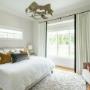 Custom white bedroom drapery with black hardware Custom white bedroom drapery with black hardware