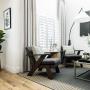 Living room featuring Norman wood shutters and Vadain drapery panels. Shutters in Cambridge. Living room featuring Norman wood shutters and Vadain drapery panels. Shutters in Cambridge.