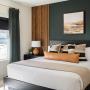 Roller shades layered with drapery to add depth to your room. Roller shades layered with drapery to add depth to your room.