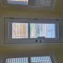 Vinyl Shutters On A Kitchen Door with French Door Cutout to Accommodate a Door Knob in a Richmond Hill Home Vinyl Shutters On A Kitchen Door with French Door Cutout to Accommodate a Door Knob in a Richmond Hill Home