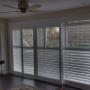 Maxxmar Vinyl Shutters with Open Bypass Track System on Sliding Patio Doors in a Thornhill Basement Workout Room Maxxmar Vinyl Shutters with Open Bypass Track System on Sliding Patio Doors in a Thornhill Basement Workout Room