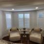 Framed Vinyl Shutters with Split-Tilt on Living Room Windows in a Richmond Hill Home Framed Vinyl Shutters with Split-Tilt on Living Room Windows in a Richmond Hill Home