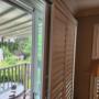 Vinyl Shutters with Bypass Track System and 3 1/2 Inch Louvers on a Patio Door in a Thornhill Home Vinyl Shutters with Bypass Track System and 3 1/2 Inch Louvers on a Patio Door in a Thornhill Home