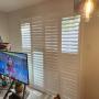Framed Vinyl Shutters with Bi-Fold, 3 ½” Louvers, and a Divider Rail on a Patio Door in a Thornhill Home Framed Vinyl Shutters with Bi-Fold, 3 ½” Louvers, and a Divider Rail on a Patio Door in a Thornhill Home