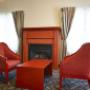 Relax by the fireplace in the lobby Relax by the fireplace in the lobby