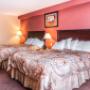 Guest room with queen beds Guest room with queen beds