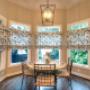 Here’s a breakfast nook draped in elegance! Our Roman Shades make a beautiful statement. Let us help you create Shades in the perfect pattern for your decor! Here’s a breakfast nook draped in elegance! Our Roman Shades make a beautiful statement. Let us help you create Shades in the perfect pattern for your decor!