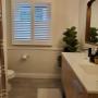 Isn’t this Chatham bathroom inviting? It’s got a clean, modern but relaxed vibe—and that’s thanks in part to the Composite Shutters we installed on the window! Isn’t this Chatham bathroom inviting? It’s got a clean, modern but relaxed vibe—and that’s thanks in part to the Composite Shutters we installed on the window!