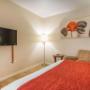 Guest room with flat-screen television Guest room with flat-screen television