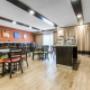 Enjoy breakfast in this seating area Enjoy breakfast in this seating area