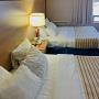 Guest room with two beds Guest room with two beds