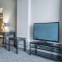 Spacious room with flat-screen television Spacious room with flat-screen television