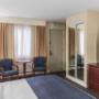 Guest room with table and chairs Guest room with table and chairs