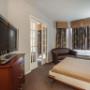 Spacious room with flat-screen television Spacious room with flat-screen television