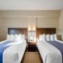 Guest room with queen beds Guest room with queen beds