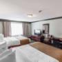 Spacious room with flat-screen television Spacious room with flat-screen television
