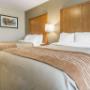Guest room with queen beds Guest room with queen beds