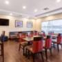 Enjoy breakfast in this seating area Enjoy breakfast in this seating area