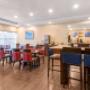 Enjoy breakfast in this seating area Enjoy breakfast in this seating area