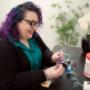 Maico Audiologist, Hilary, completing a hearing aid clean and check; Hearing Clinic & Hearing Aids in St. John's, NL Maico Audiologist, Hilary, completing a hearing aid clean and check; Hearing Clinic & Hearing Aids in St. John's, NL