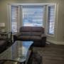 Available in a variety of styles and colors, faux wood blinds offer an array or texture-rich, wood grain finishes. These Norman Window Fashions 2 ½” cordless faux wood custom blinds complement the existing furnishings perfectly in this beautiful home! Faux wood blinds create the timeless appeal of g Available in a variety of styles and colors, faux wood blinds offer an array or texture-rich, wood grain finishes. These Norman Window Fashions 2 ½” cordless faux wood custom blinds complement the existing furnishings perfectly in this beautiful home! Faux wood blinds create the timeless appeal of g