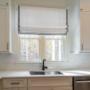 Roman Shades add style and complete this kitchen window. Roman Shades add style and complete this kitchen window.