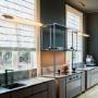 Gorgeous Roman Shades provide a dramatic look in this kitchen. Gorgeous Roman Shades provide a dramatic look in this kitchen.