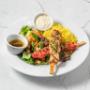 Mixed kebob lunch plate, served with basmati rice and garden salad. Mixed kebob lunch plate, served with basmati rice and garden salad.