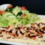 Key of Life- made with a bed of house made hummus, topped off with Chicken Shawarma, served with Garden Salad Key of Life- made with a bed of house made hummus, topped off with Chicken Shawarma, served with Garden Salad