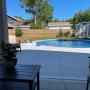 Pool area with patio furniture. The home owner is really pleased with the finished work. Pool area with patio furniture. The home owner is really pleased with the finished work.